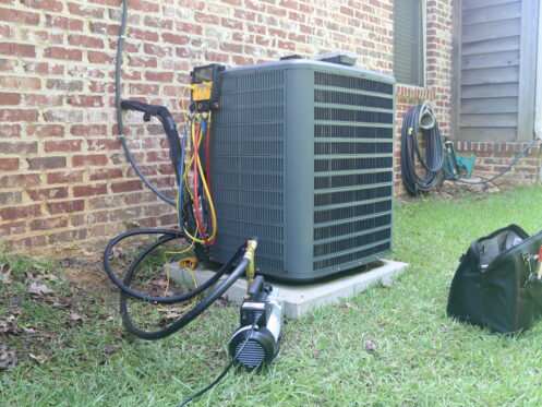 Air conditioning maintenance on a unit in Denver