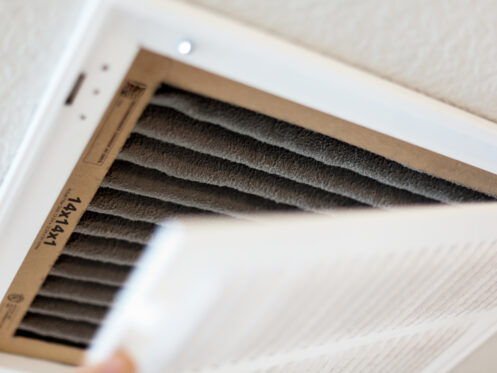 A dirty AC air filter that needs to be replaced